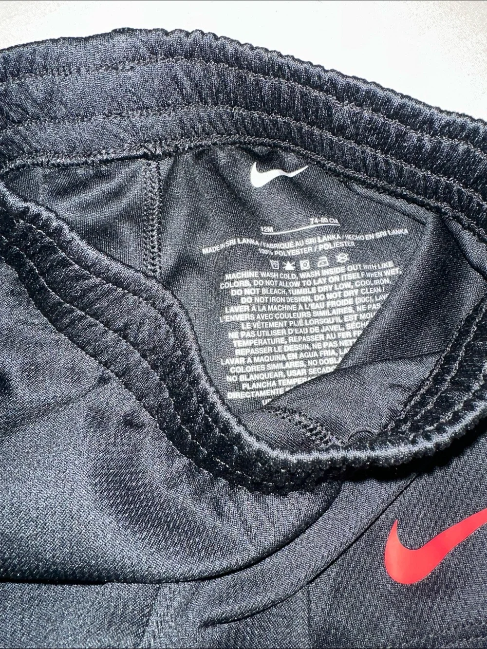 Kids Size 12M Nike Black Athletic Shorts with Red Swoosh